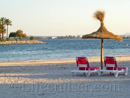 Beach bed pair at Alcudia Beach, Majorca, Photo Copyright Lifecruiser.com