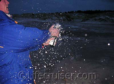 Mr Lifecruiser opening the champagne bottle