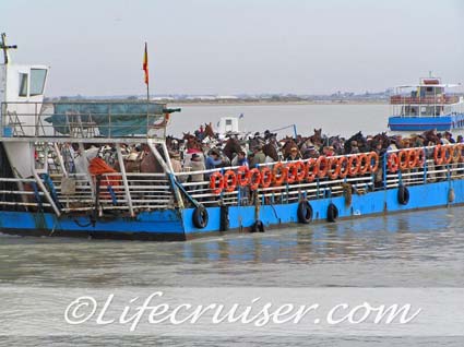 Romeria San José romero's on Sanlúcar ferry, Photo by Lifecruiser