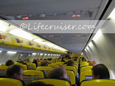 Ryanair flight passengers in airplane