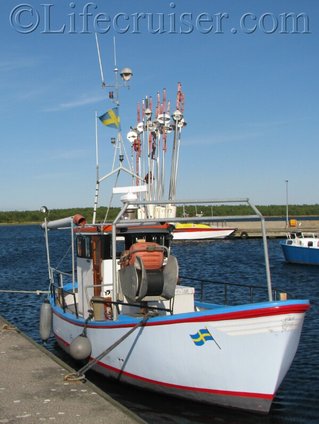 Fårö fishing-boat with Swedish flag, Gotland, Sweden