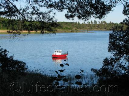 Red boat on Vänern lake, Sweden